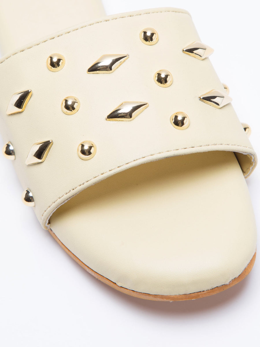 Windlust sleek studded yellow flats featuring a pointed toe and stylish design, perfect for casual or dressy occasions.