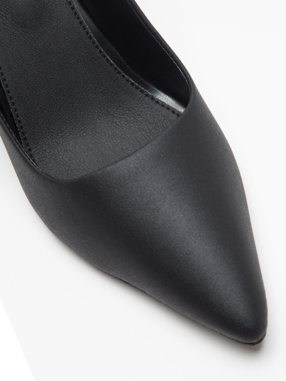 Pair of Windlust matte black stiletto heels with pointed toes and high heels, stylish and elegant footwear for formal occasions.