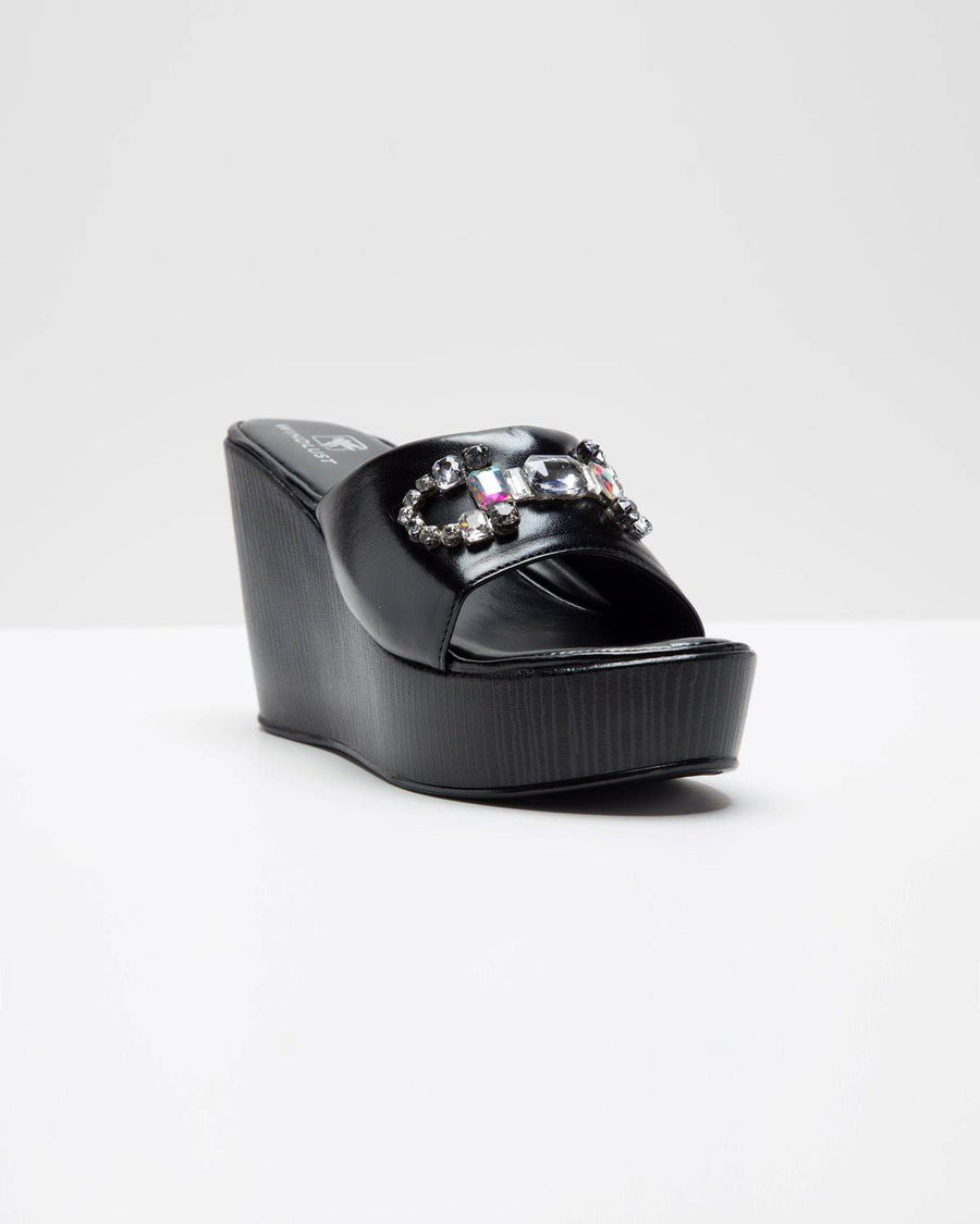 Black Stone Embellished Wedges by Windlust, featuring a stylish wedge heel with decorative stone accents.