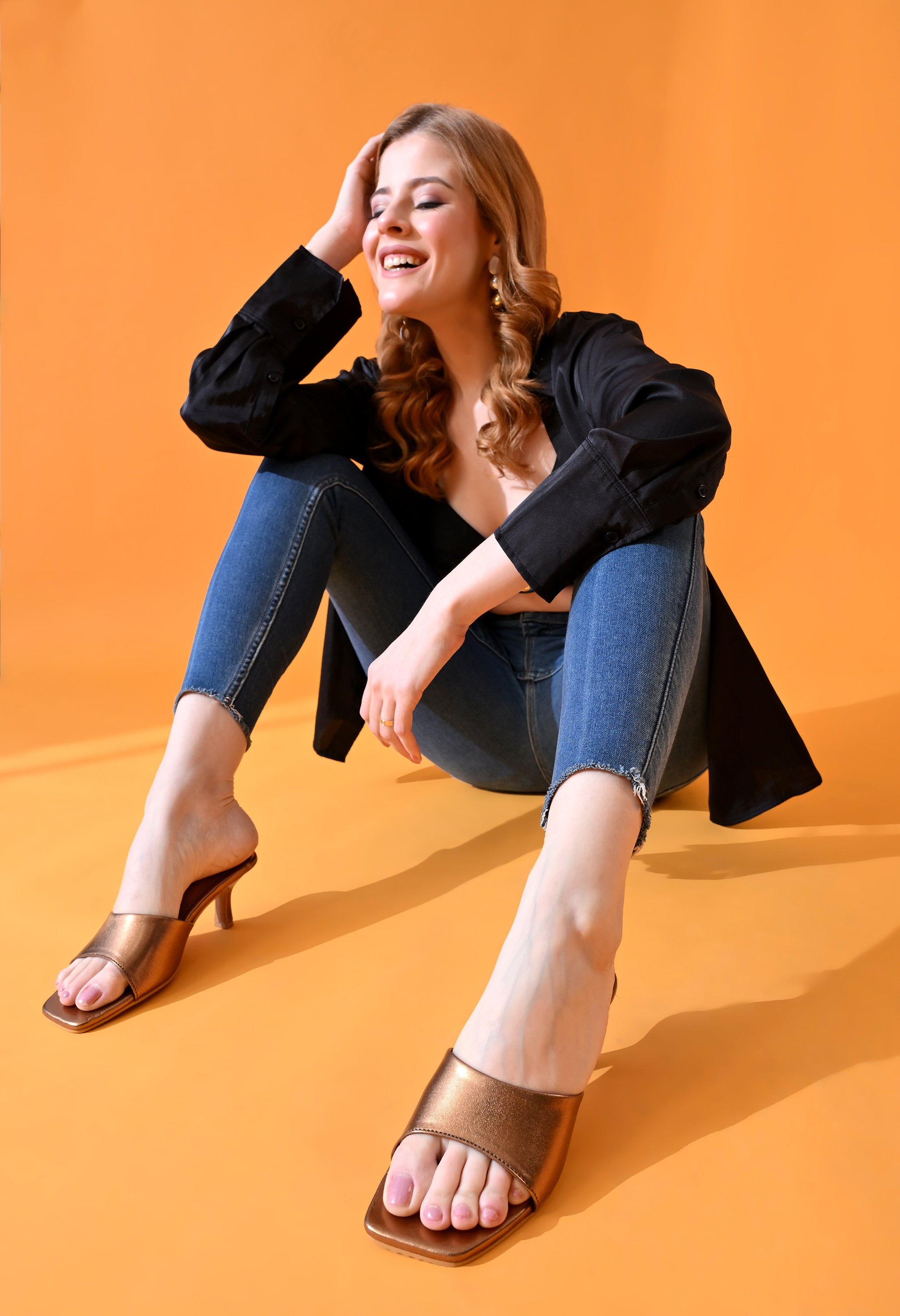 Bronze Glow Windlust kitten heels with minimal band design, stylish and elegant for modern fashion.
