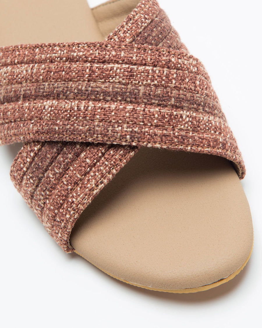 Windlust beige and wine cross-strapped jute flats with open toe design and woven jute sole.