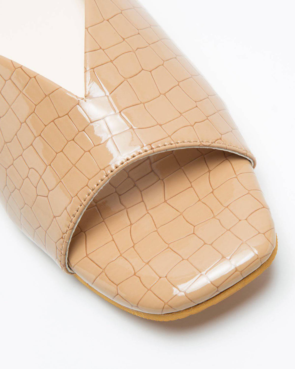 Beige Ergo Croc Leather Pattern Flats by Windlust featuring a sleek, textured leather design and comfortable slip-on style.