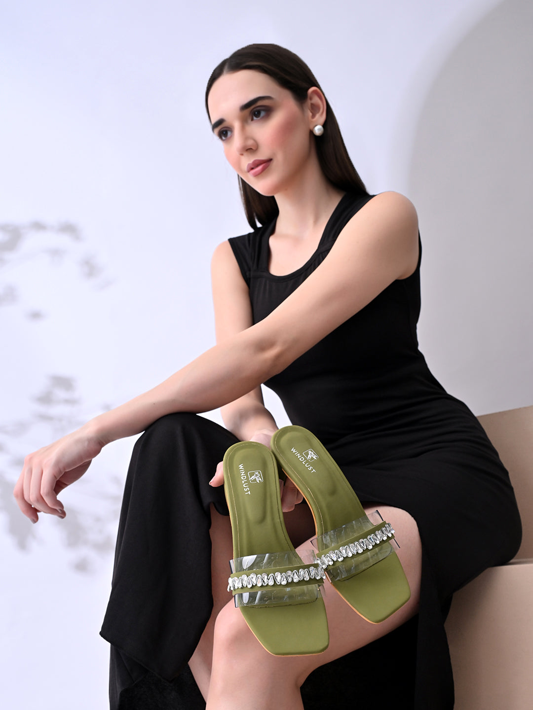 Deep green Swarovski-embellished clear heels by Windlust, stylish high heels with sparkling details and elegant design.