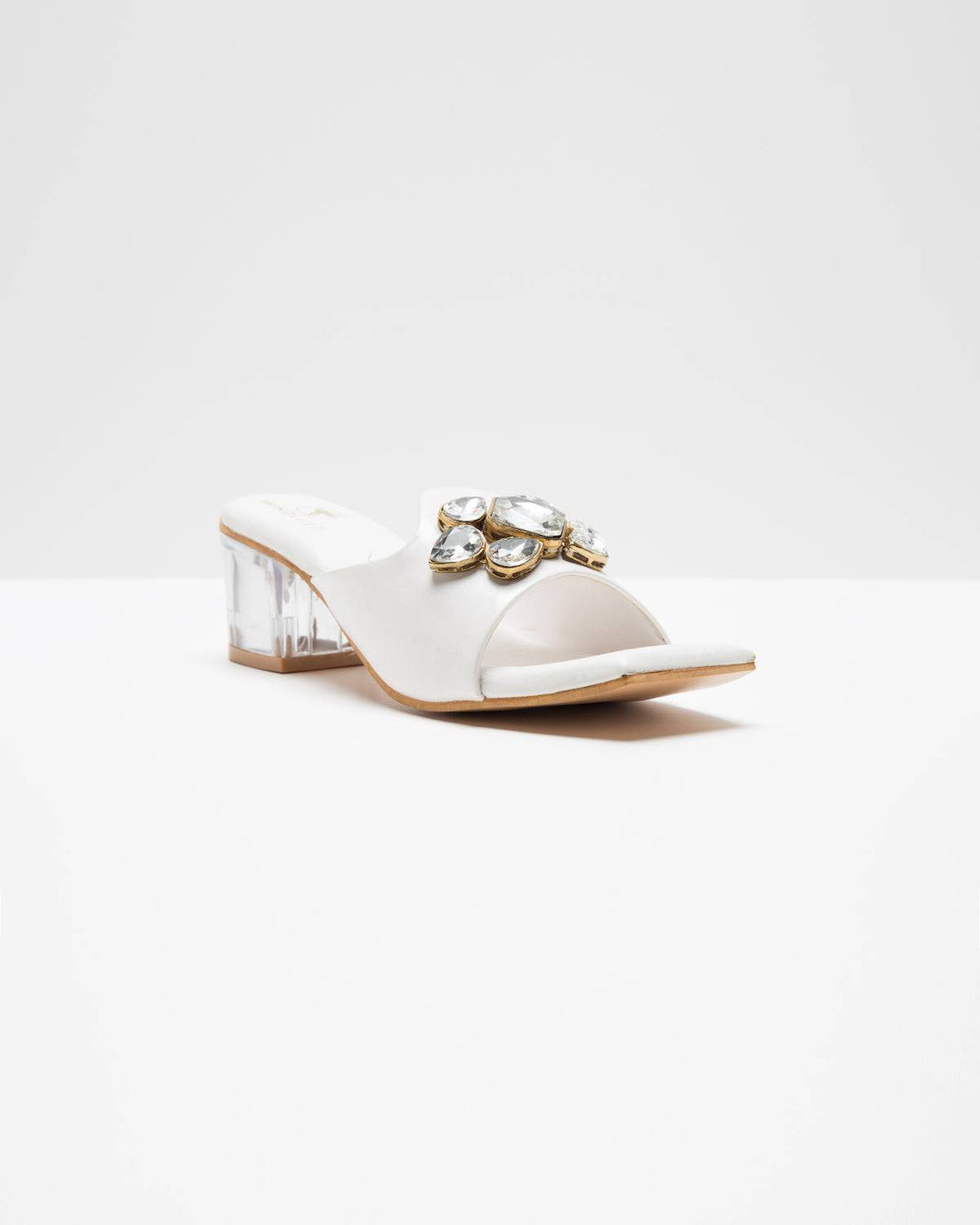 White Windlust Jewel Up Heels featuring elegant design with sparkling embellishments and a stylish heel for formal occasions.