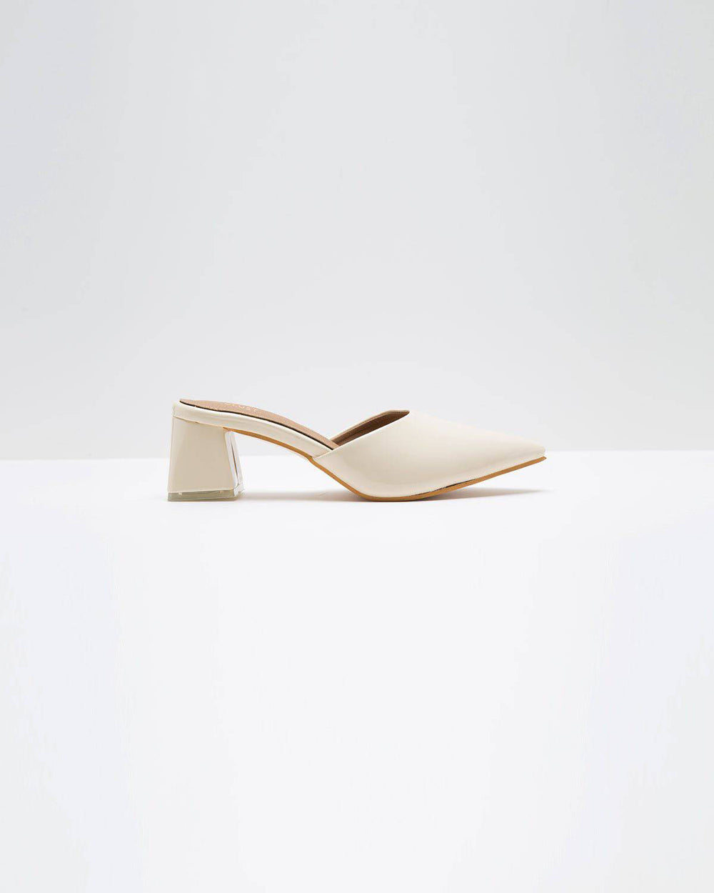 Windlust luxury cream solid mule heels, stylish slip-on footwear with a sleek design and comfortable fit.