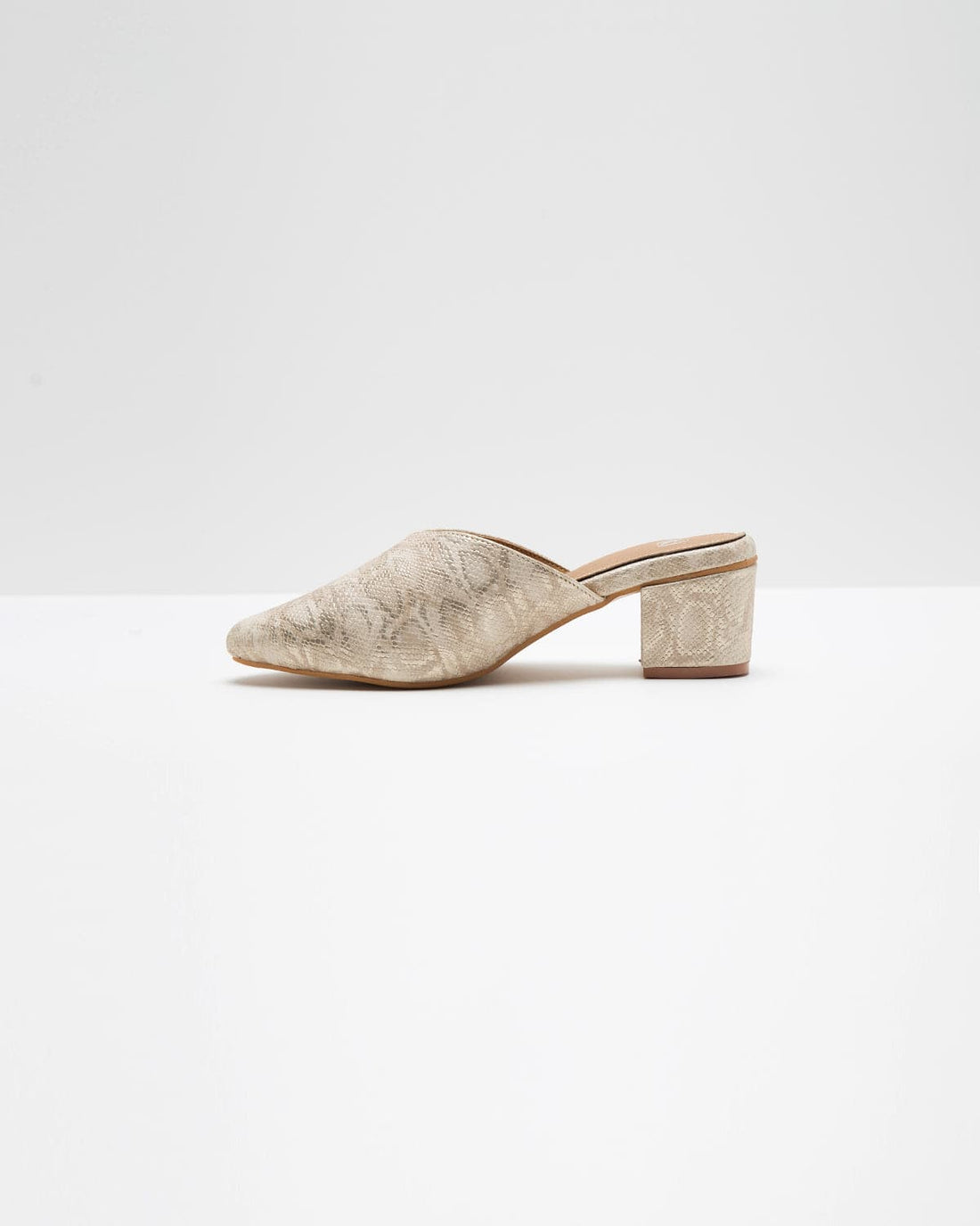 Windlust Annaconda Pattern Mules showing slip-on design with bold animal print, stylish footwear for casual or dressy occasions.