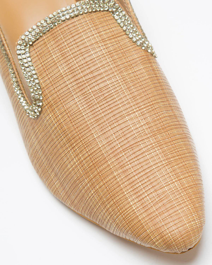 Fine textured beige mules by Windlust featuring a sleek design and comfortable slip-on style for casual and stylish wear.